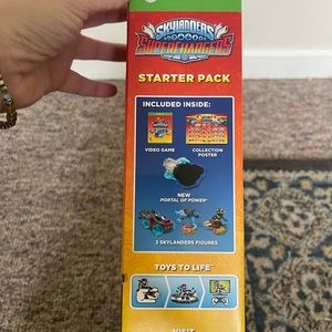Brand new never used Xbox one skylamders supercharger starter pack